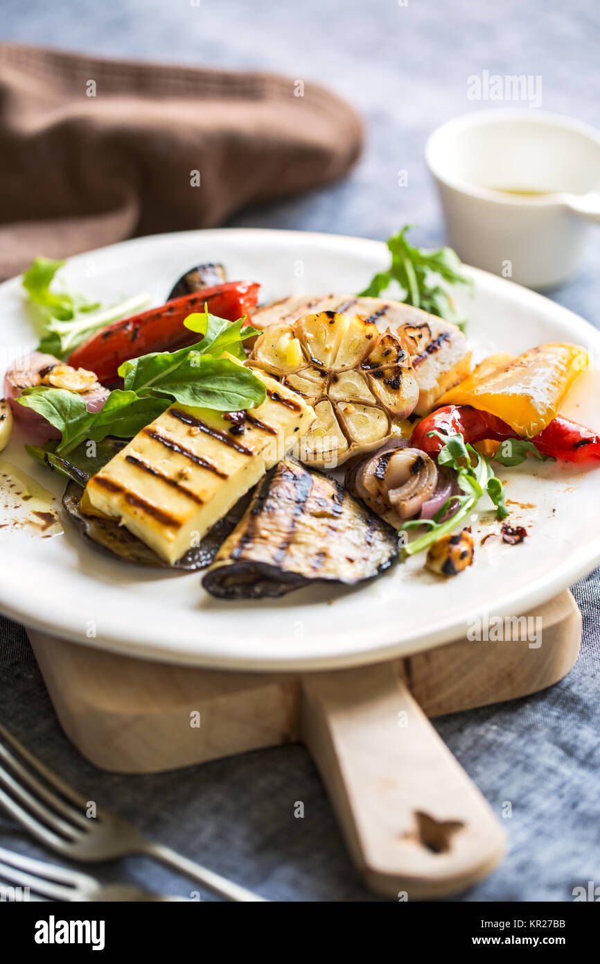 Grilled Halloumi with aubergine and pepper salad Stock Photo Alamy