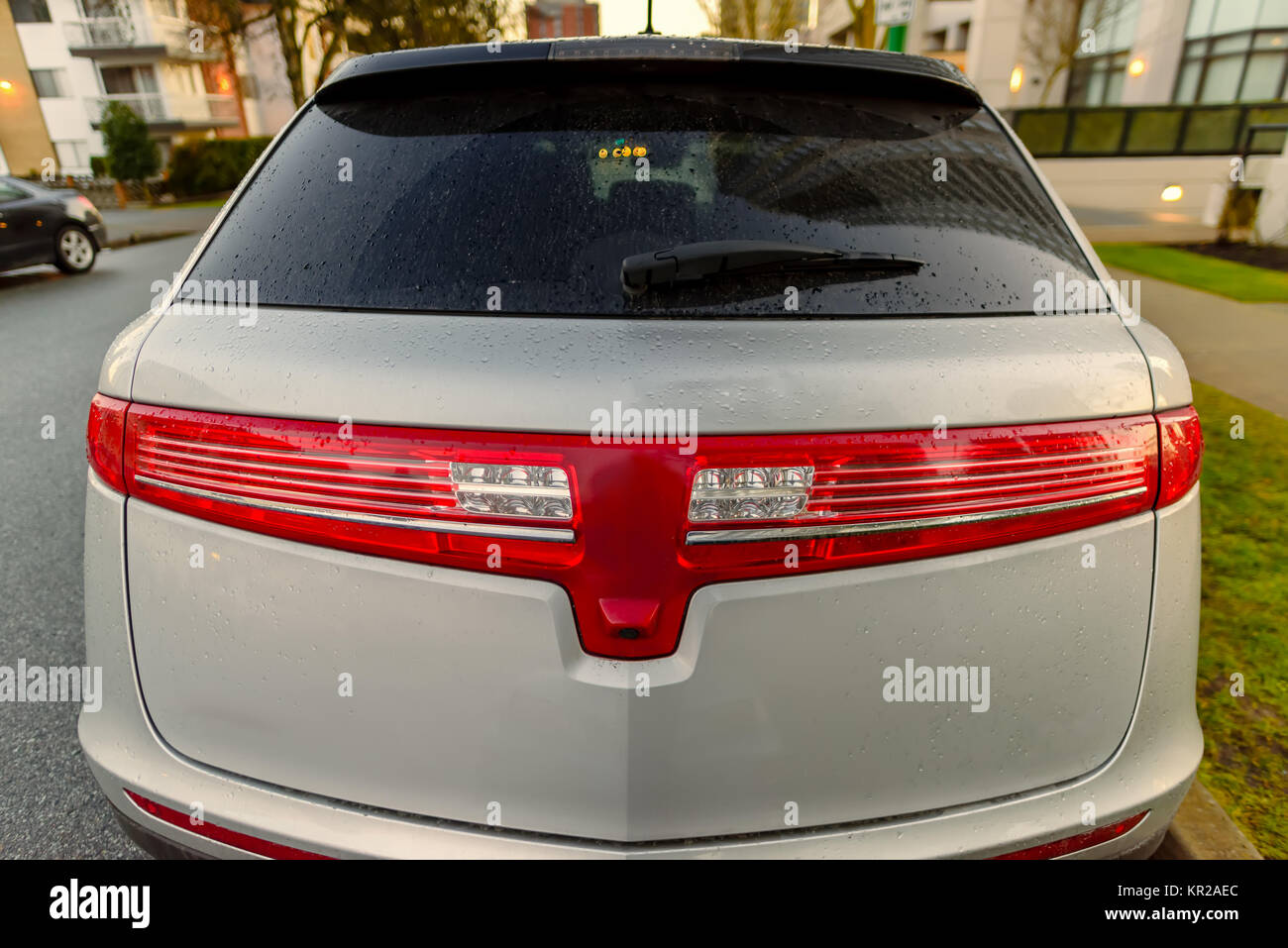 rear view of the car parked in the city, in the afternoon, in the ...