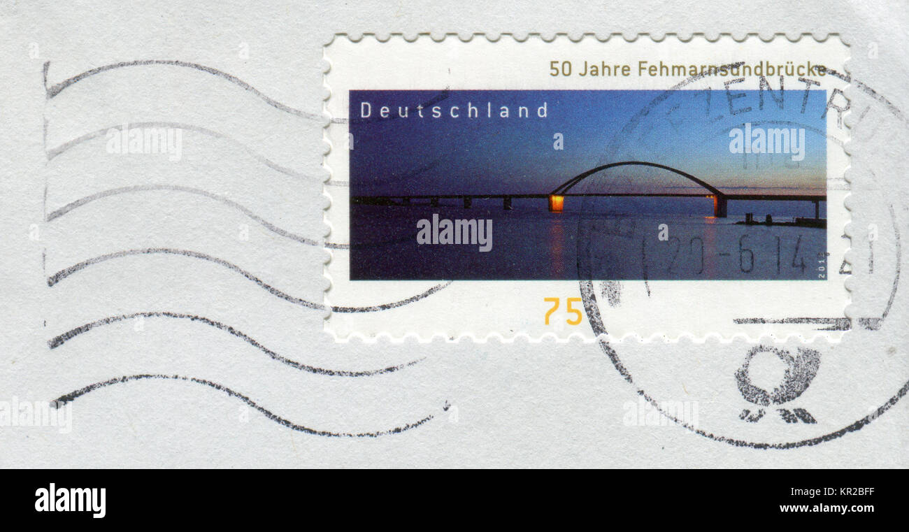 GOMEL, BELARUS, 15 DECEMBER 2017, Stamp printed in Germany shows image of The Fehmarn Sound Bridge, circa 2013. Stock Photo