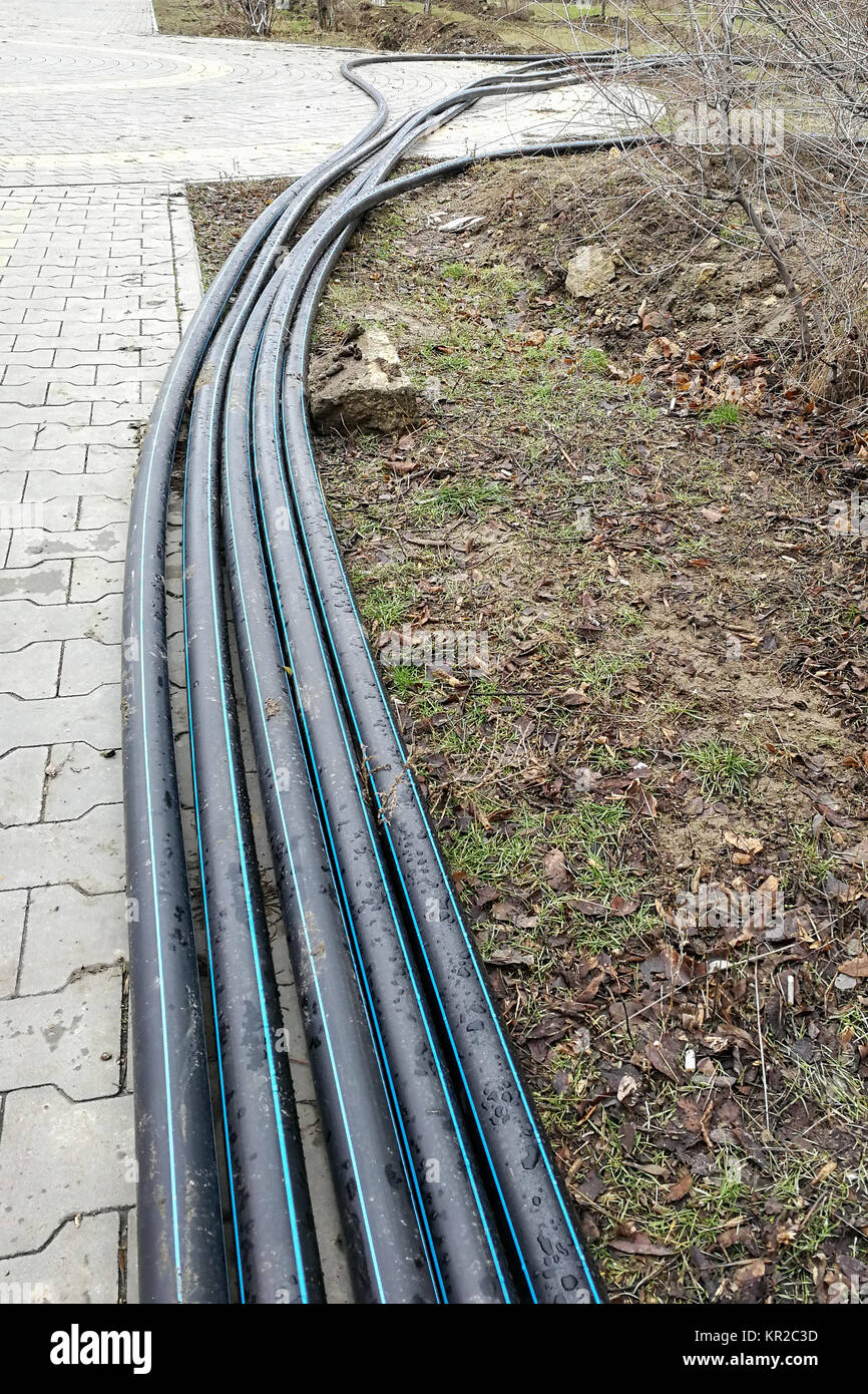 Laying of the sprinkler system of the pipeline in the ground trenches for the underground