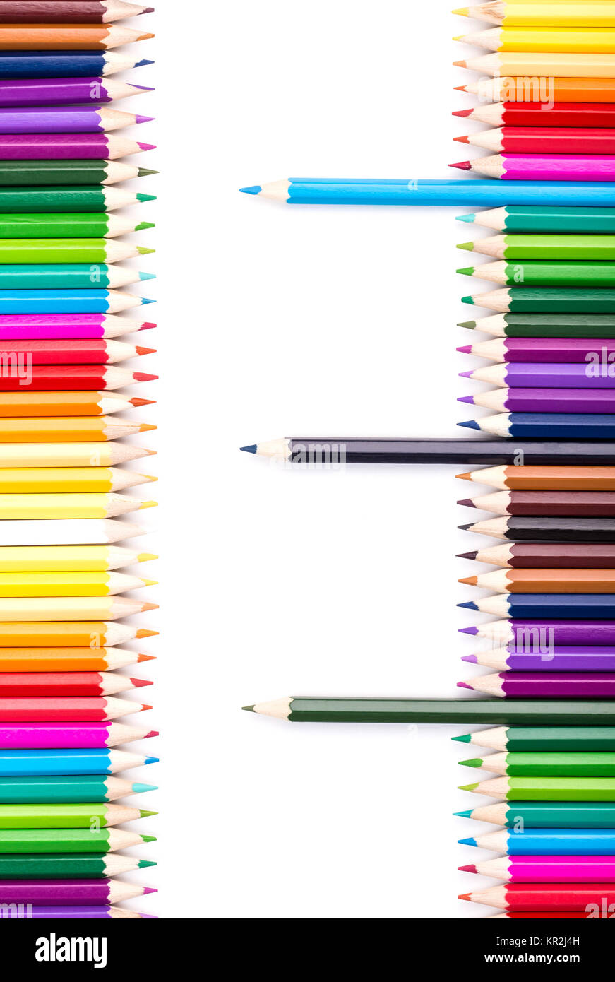 Color pencils with three pencils standing out on right Stock Photo