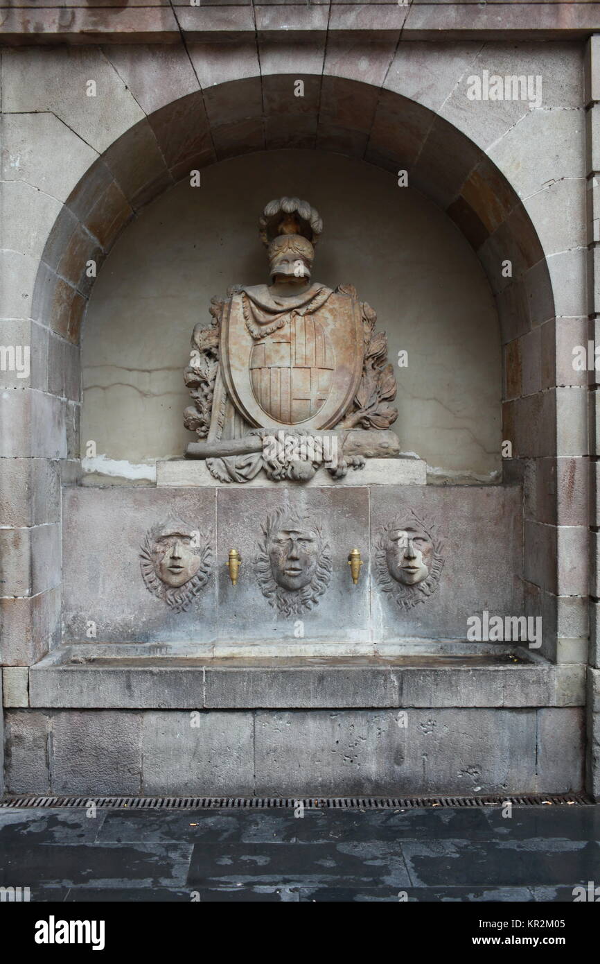 old drinking fountain near the monument to the medieval knight Stock Photo