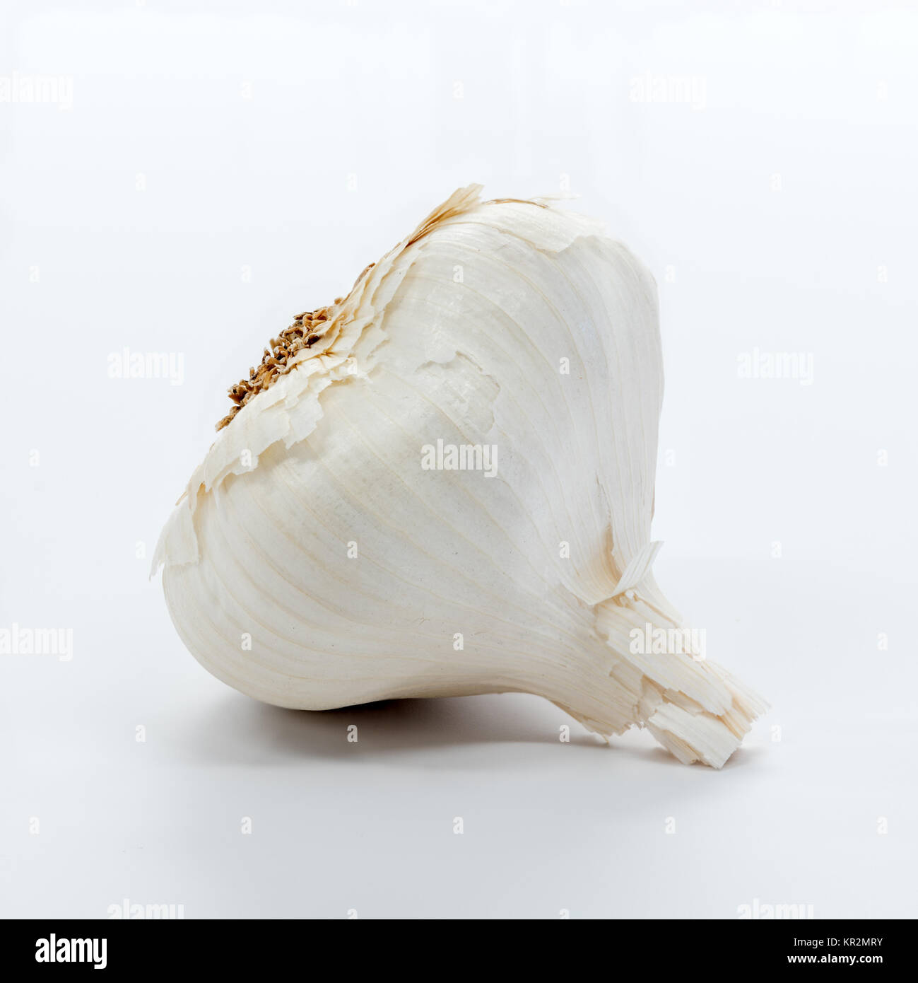Unpeeled Garlic cloves on a white background Stock Photo Alamy