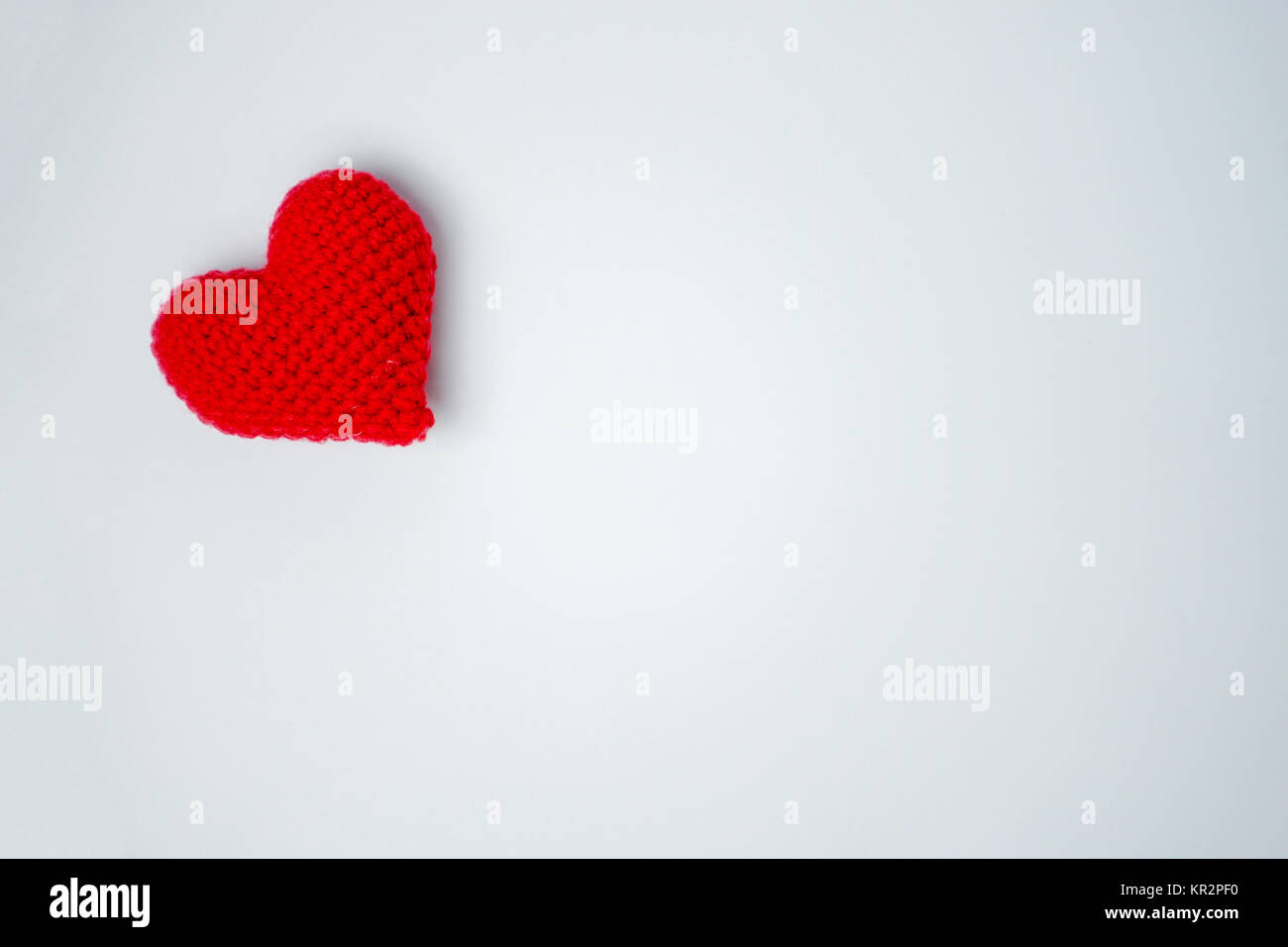 red heart on a white background Stock Photo - Alamy