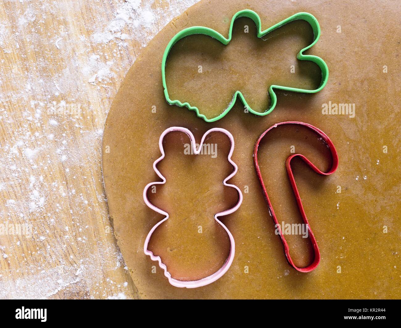 plastic cookie cutter on gingerbread dough Stock Photo Alamy