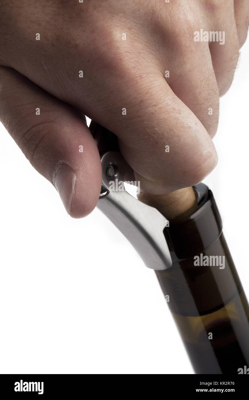 pulling cork out of wine bottle Stock Photo Alamy