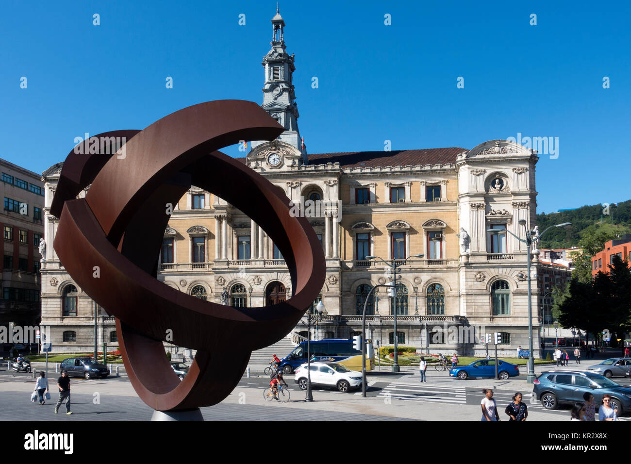 Sculpture (artist: Jorge Oteiza Title:Variante Ovoide)and city hall.Bilbao.Vizcaya.Spain Stock Photo