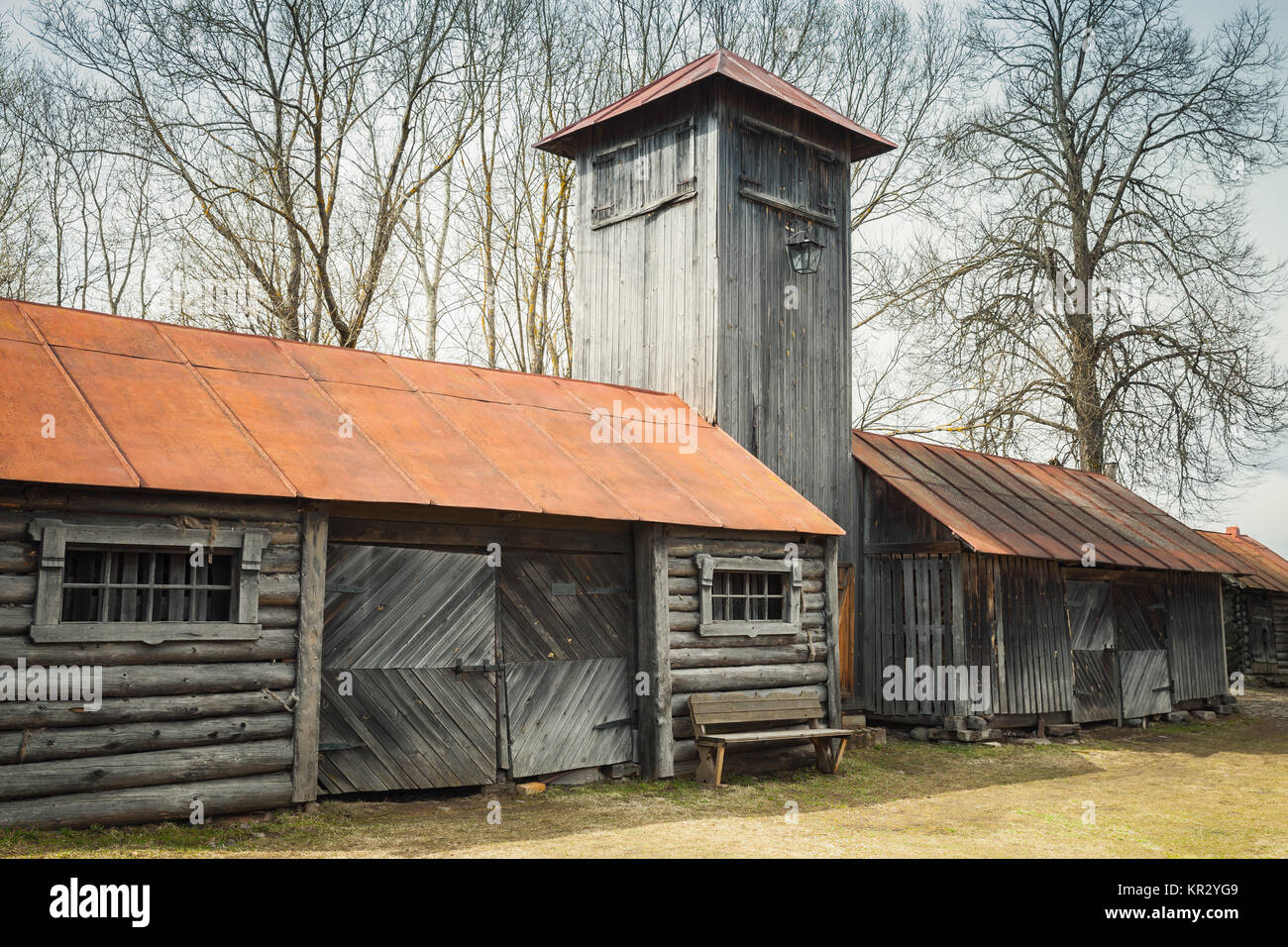 Weathered Wooden Barns In Old Russian Village Stock Photo
