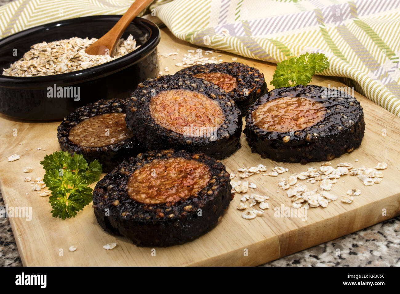 grilled spicy black and white pork pudding roll made with oatmeal Stock
