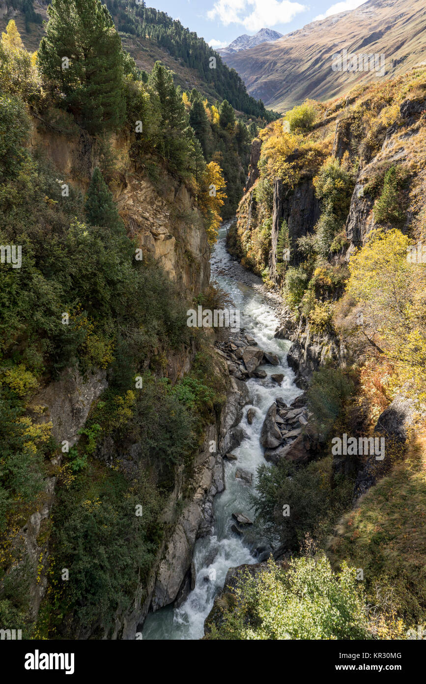 The Alps Rivers Mountain river and trees landscape natural environment. Hiking in the ...