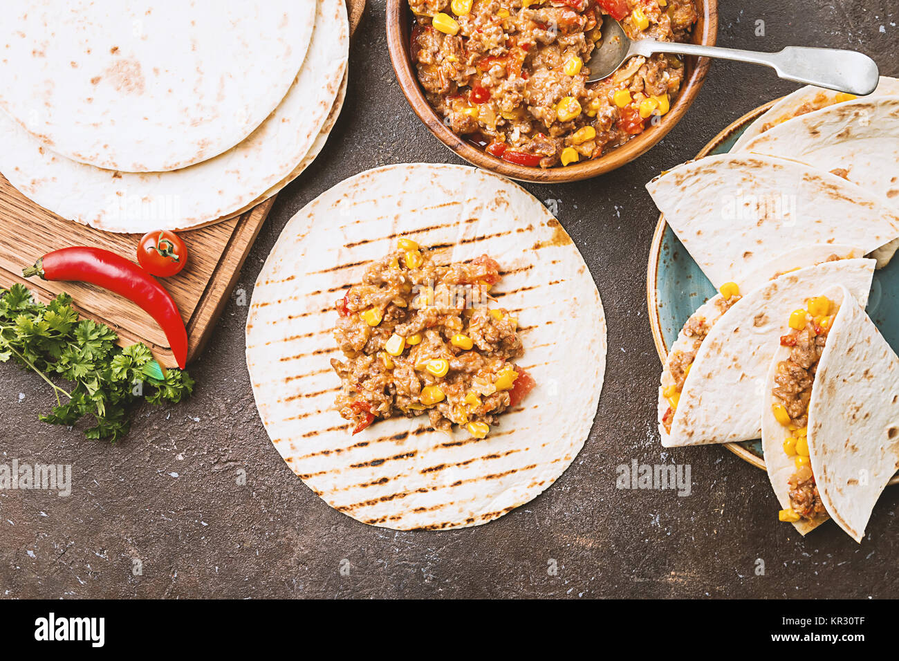 Homemade beef meat mexican fajitas with bell pepper, corn and tortilla