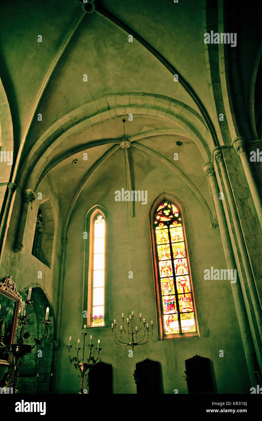 Gothic cathedral interior detail with pointed arch windows Stock Photo