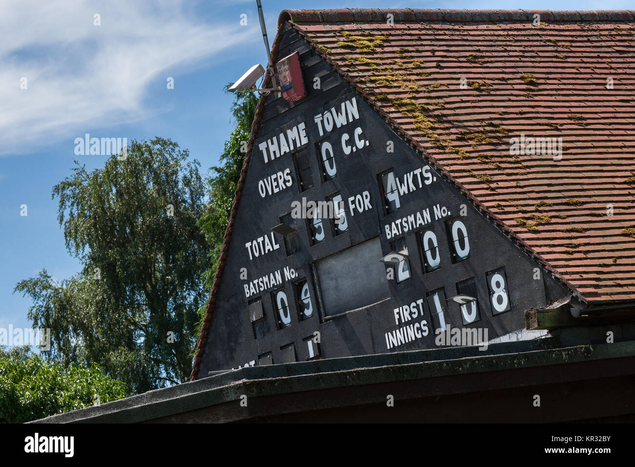Score board at Thame cricket pavillion Oxfordshire UK Stock Photo