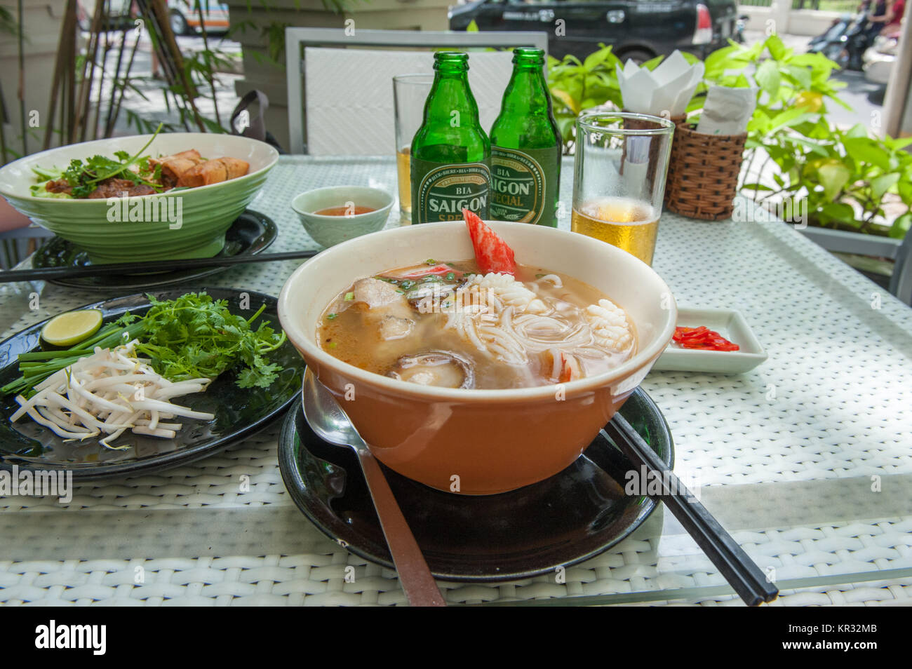 Pho, Vietnamese noodle soup served in a restaurant in  Ho Chi Minh City. Stock Photo
