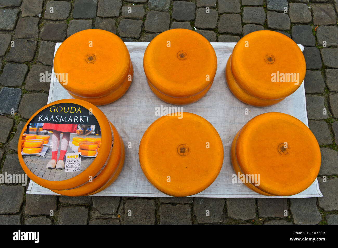 Gouda cheese wheels piled up on the cheese market, Gouda, Netherlands