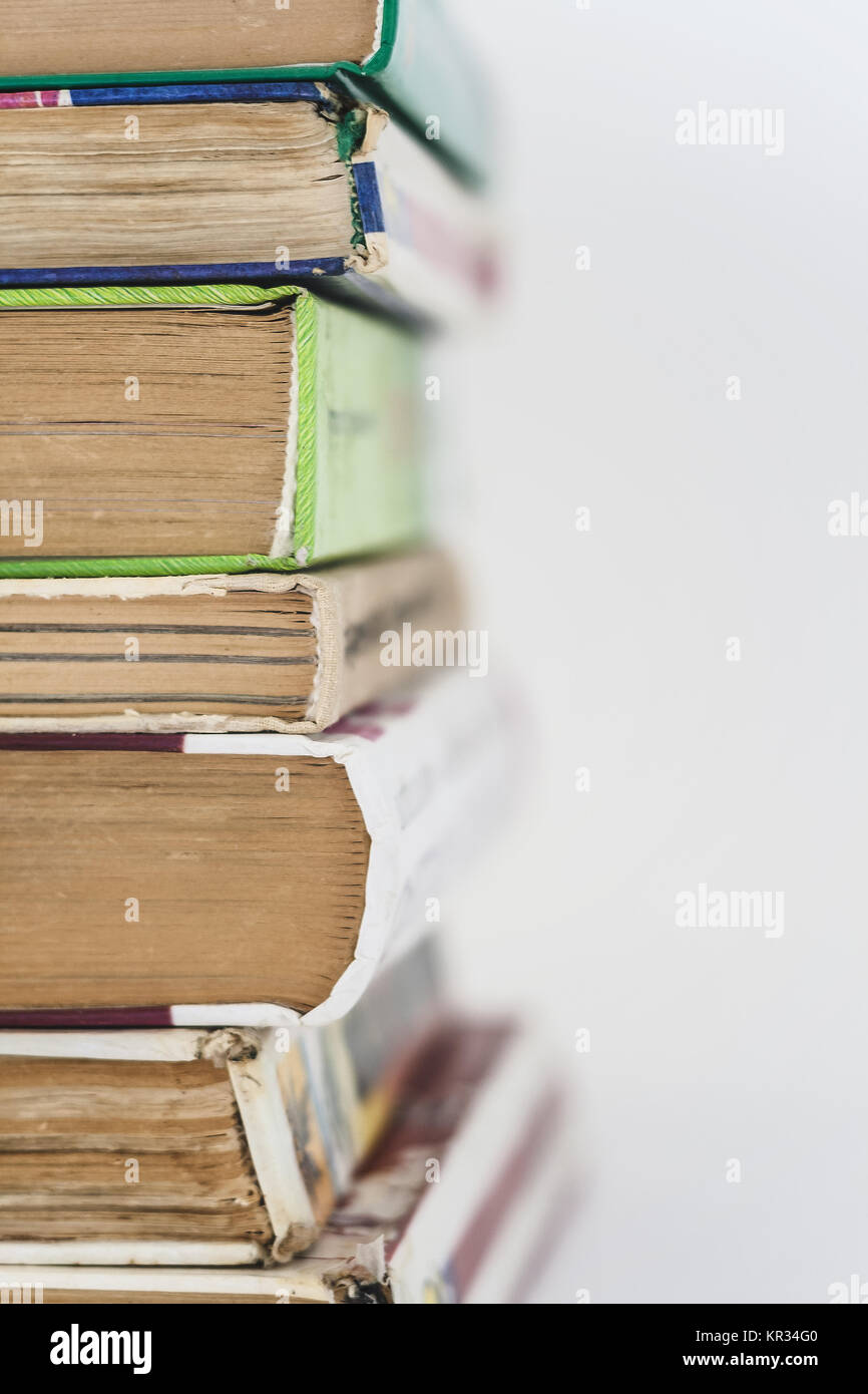 many books standing in a row isolated Stock Photo - Alamy