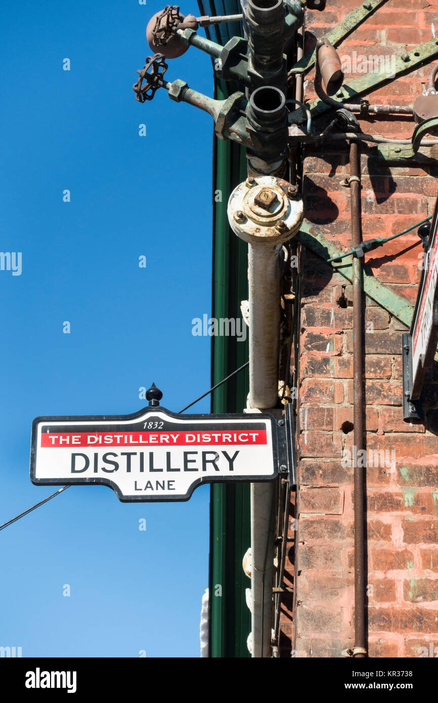 Sign on the side of a building at the intersection of Distillery lane and Trinity in the historic distillery tourist district in Toronto Canada Stock Photo