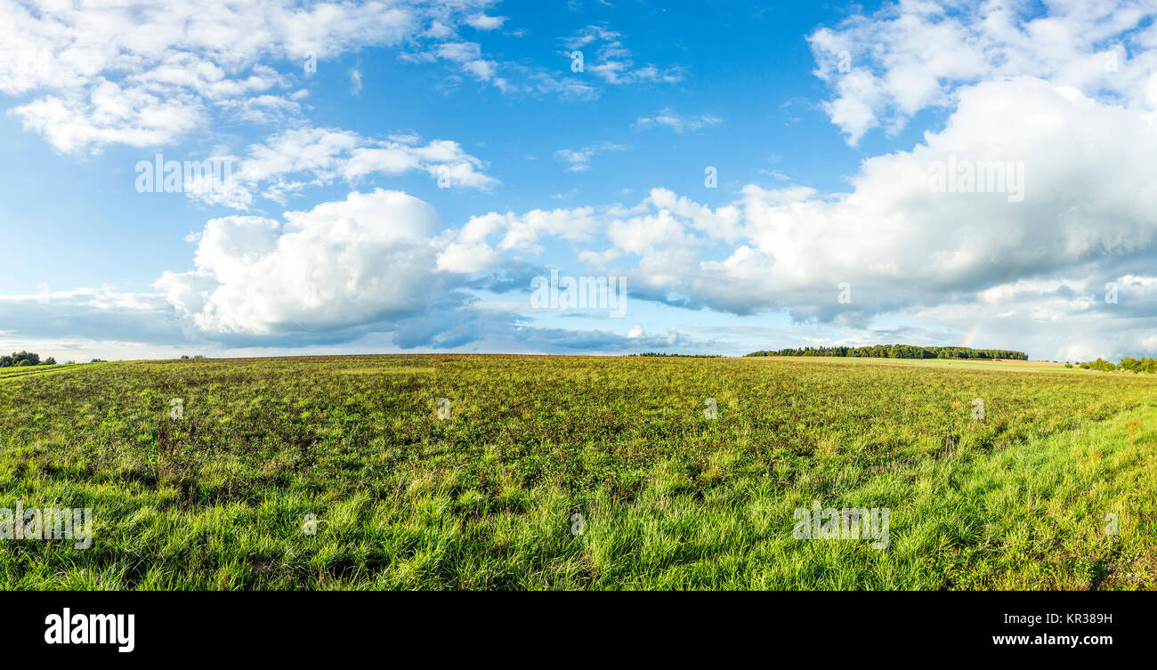 rural landscape with fields and clouds in bright sunset Stock Photo - Alamy
