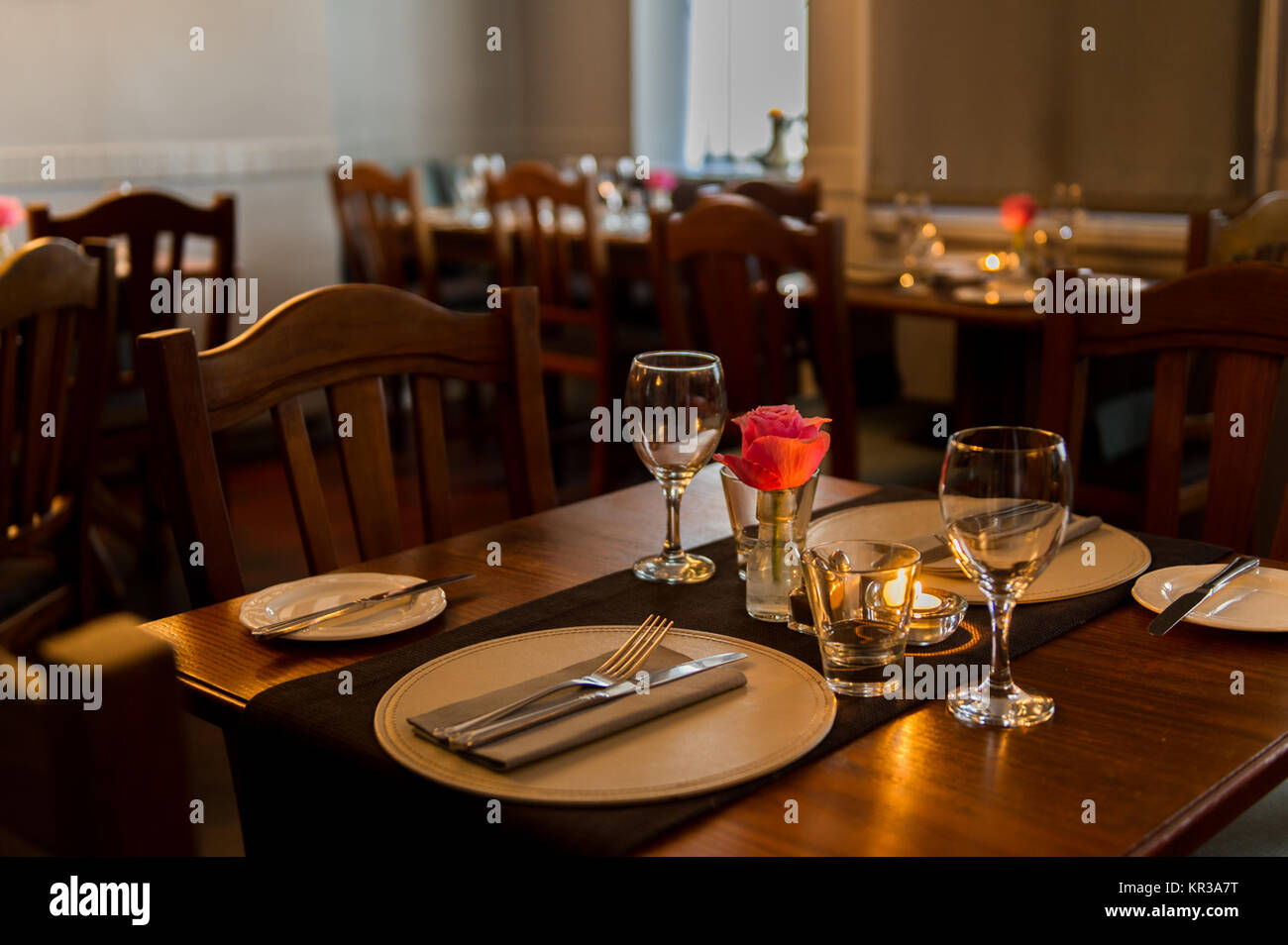 Place setting in a restaurant in a low key style with copy space in Blarney, County Cork, Ireland. Stock Photo