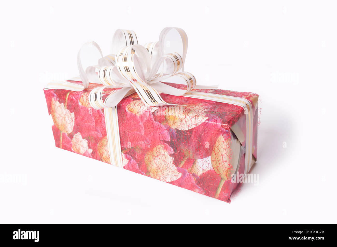 Single red gift box with silver ribbon on white background Stock Photo ...