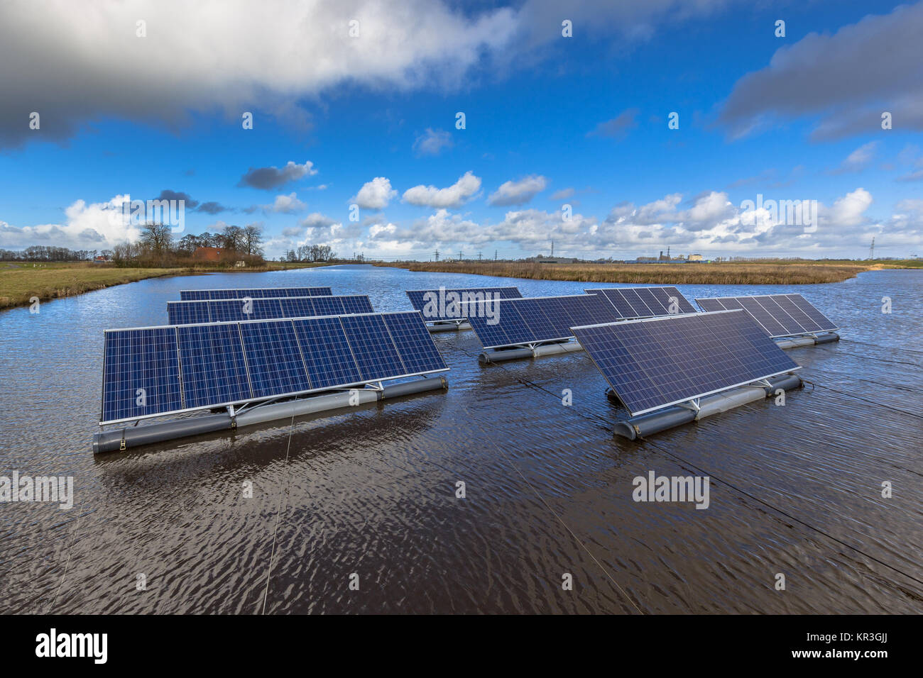 Group of photovoltaic panels floating on open water bodies can represent a serious alternative to ground mounted solar systems Stock Photo