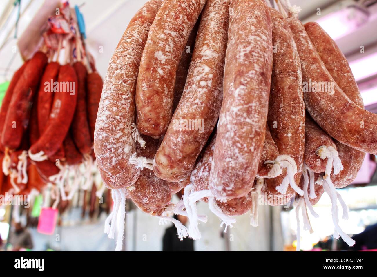 Spicy pork sausage for sale at a market stall in Spain Stock Photo Alamy