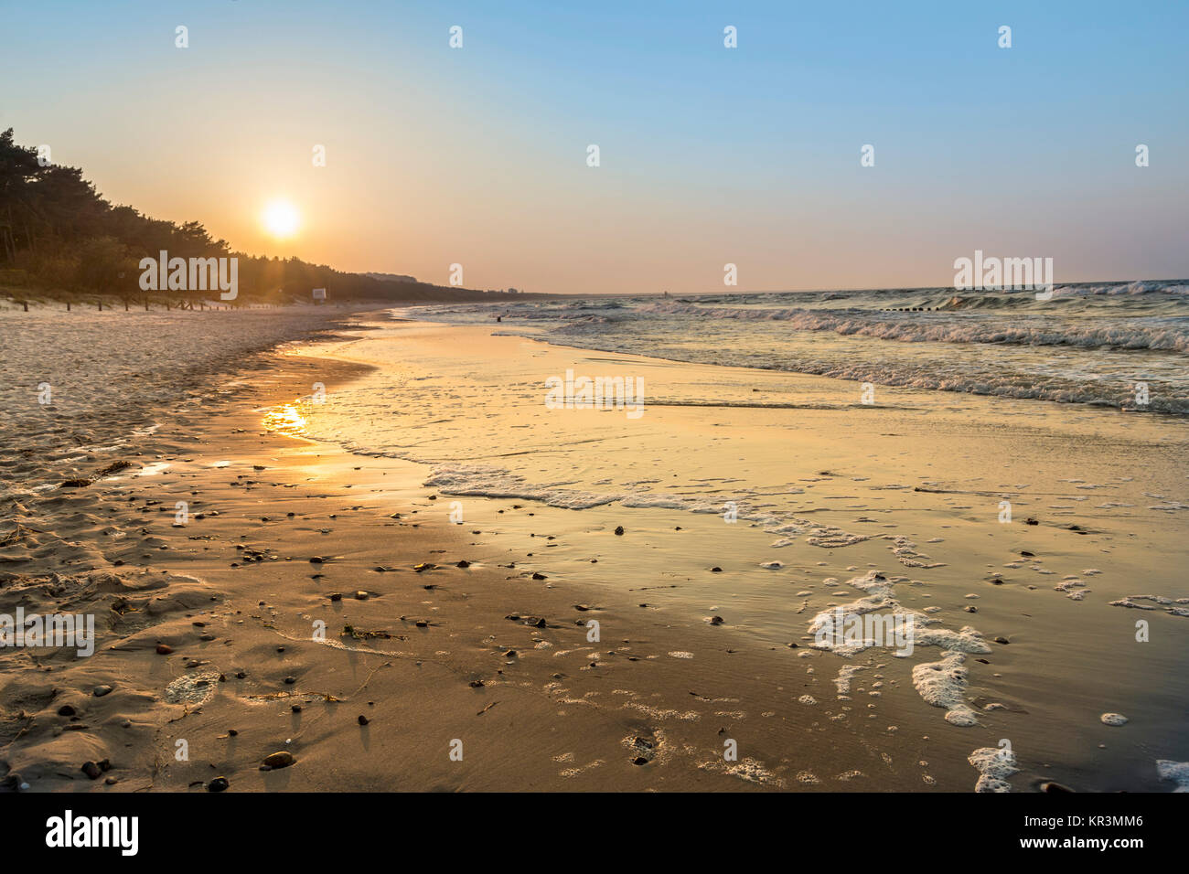 sunset at the beach of the baltic sea in detail Stock Photo - Alamy