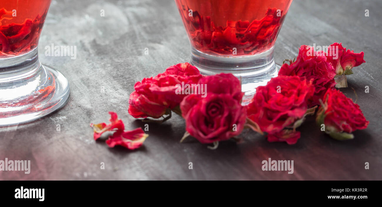 red drink and roses Stock Photo Alamy