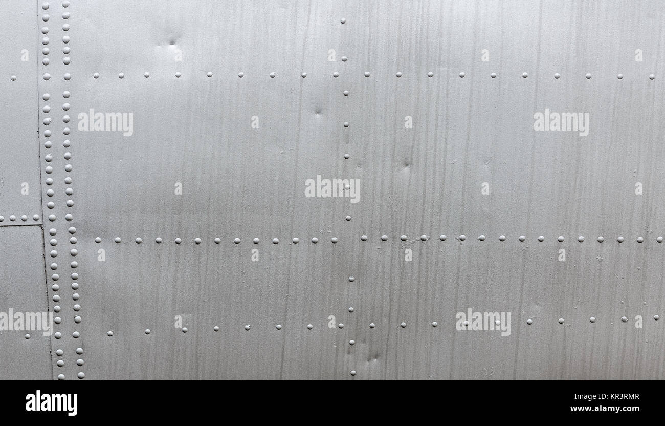 Aluminum texture with rivets Stock Photo - Alamy