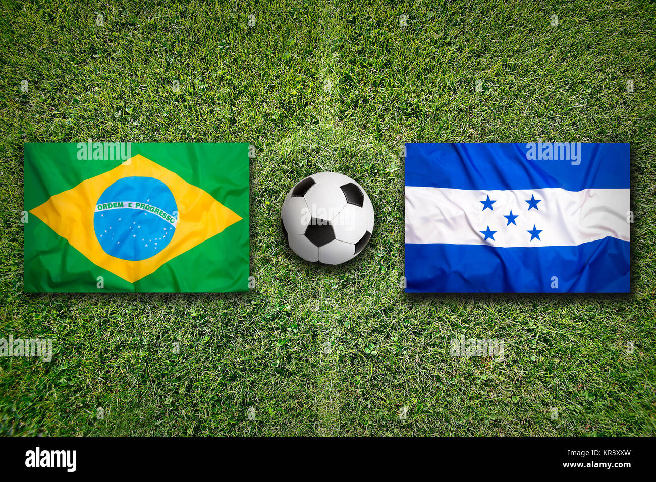 Brazil vs. Honduras flags on soccer field Stock Photo Alamy