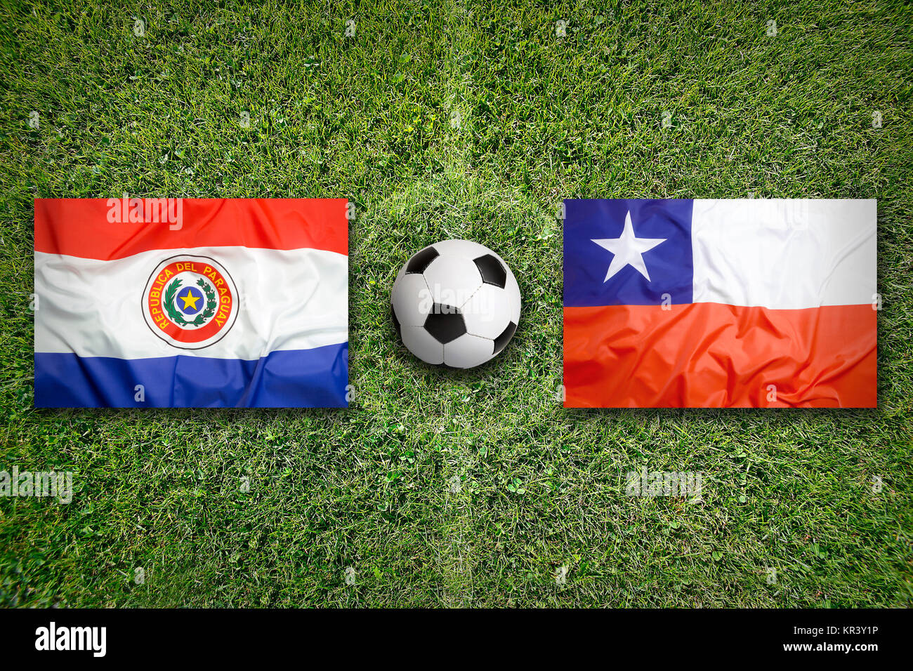 Paraguay vs. Chile flags on soccer field Stock Photo Alamy