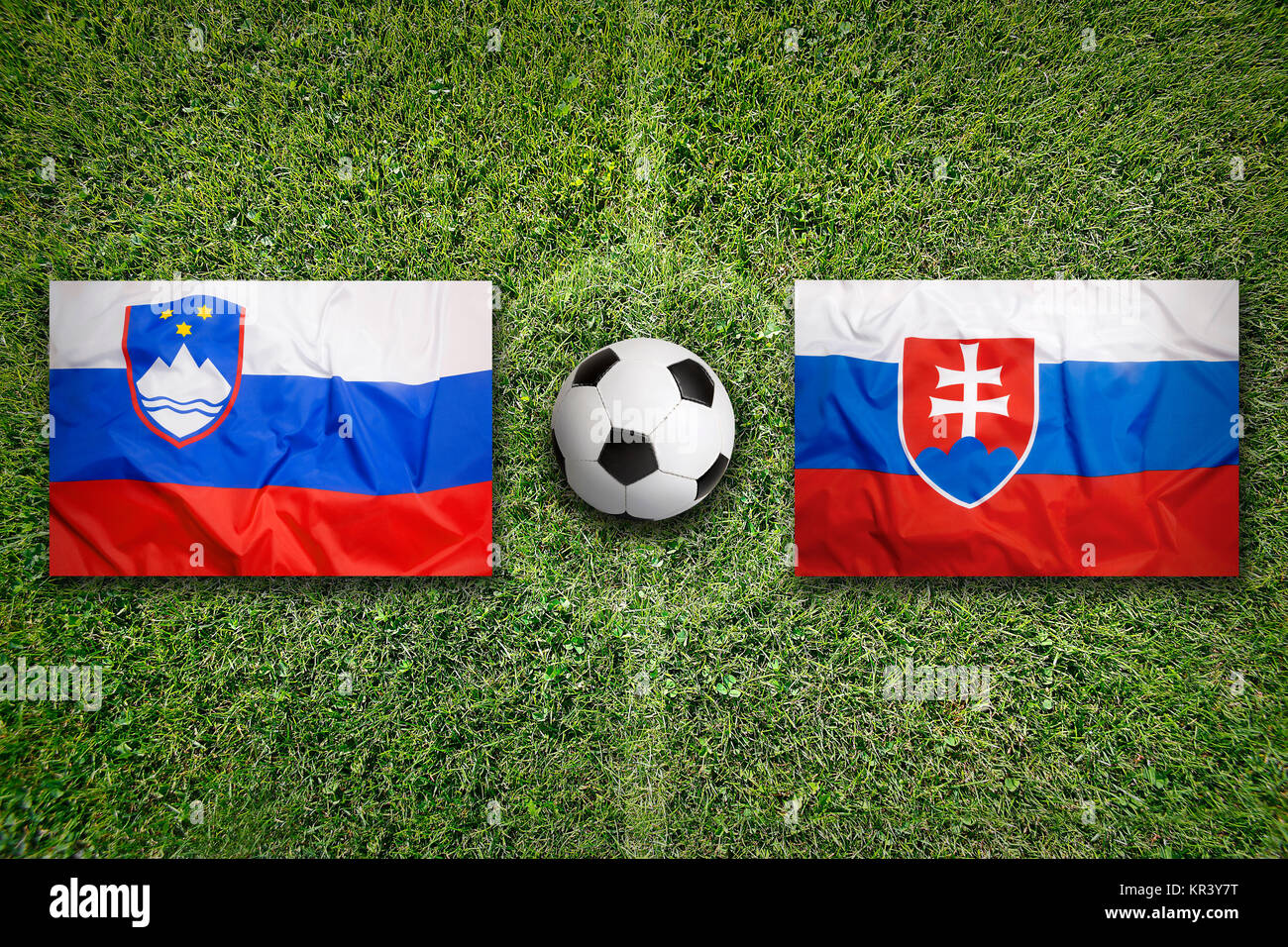 Slovenia vs. Slovakia flags on soccer field Stock Photo Alamy