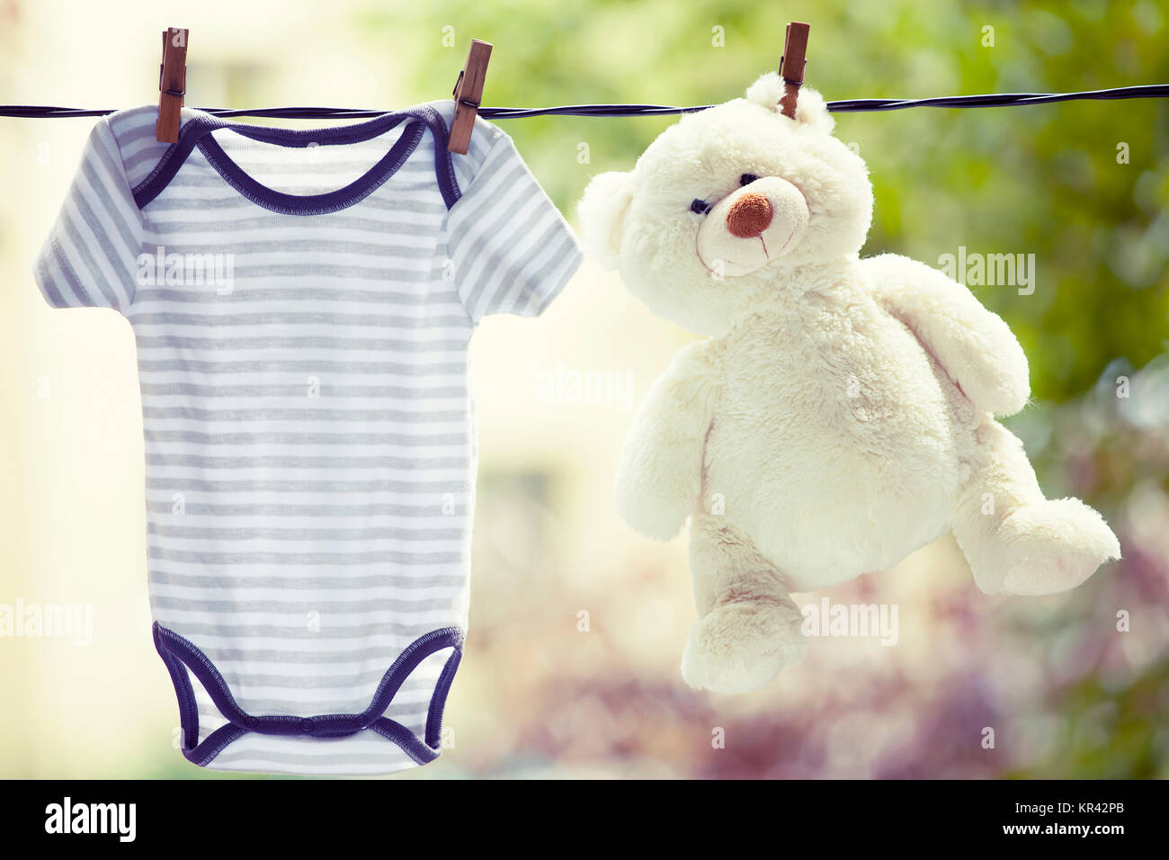 Baby clothes hanging on the clothesline Stock Photo Alamy