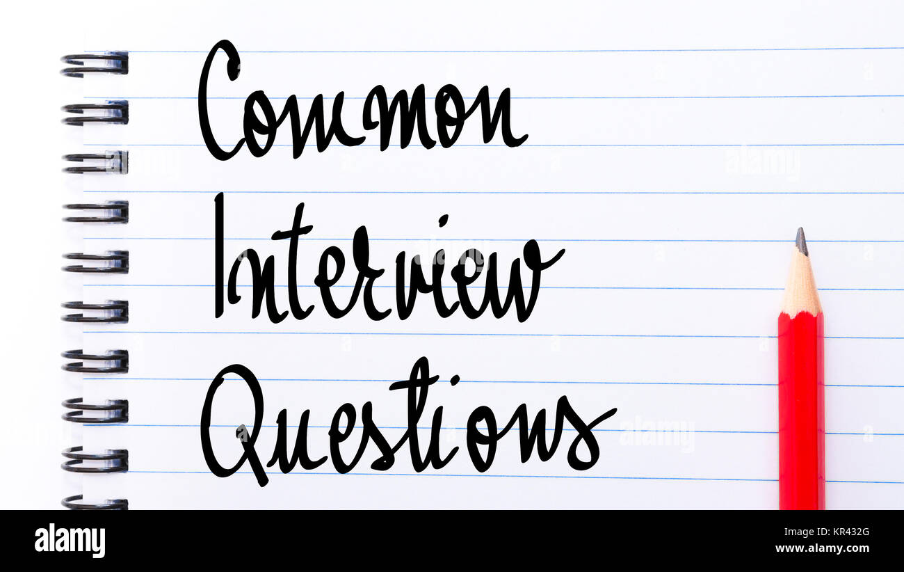 Common Interview Questions written on notebook Stock Photo