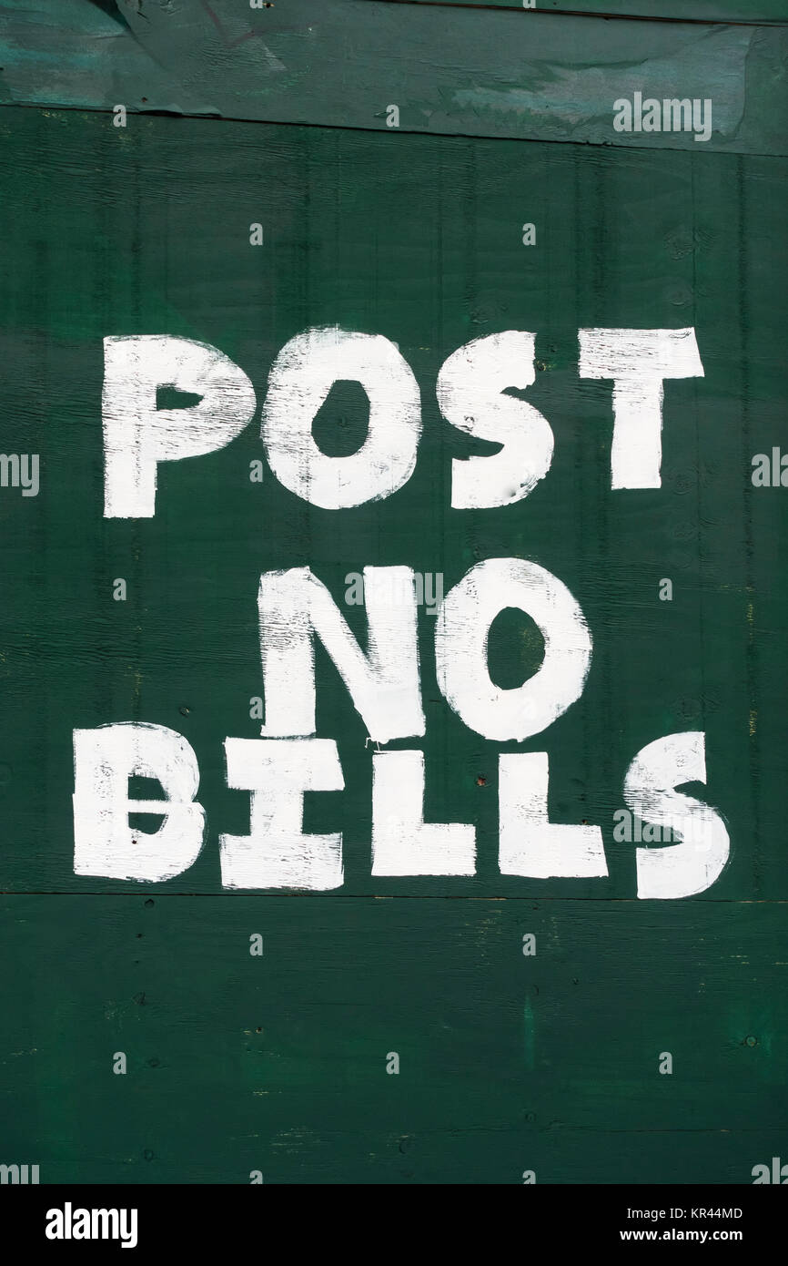 Post no bills sign painted on a closed shop in New York City Stock Photo