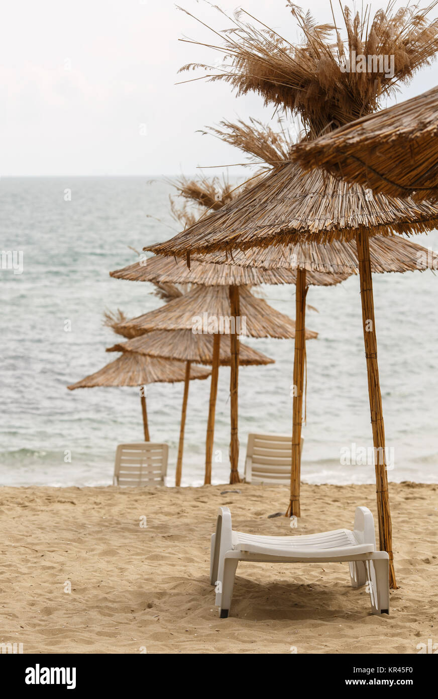 Beach umbrella made of straw Stock Photo Alamy