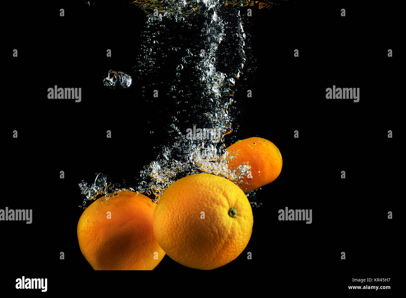 Oranges in water Stock Photo Alamy