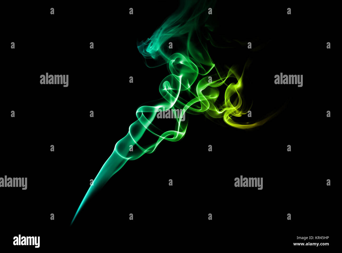 Green and blue smoke on dark Stock Photo - Alamy