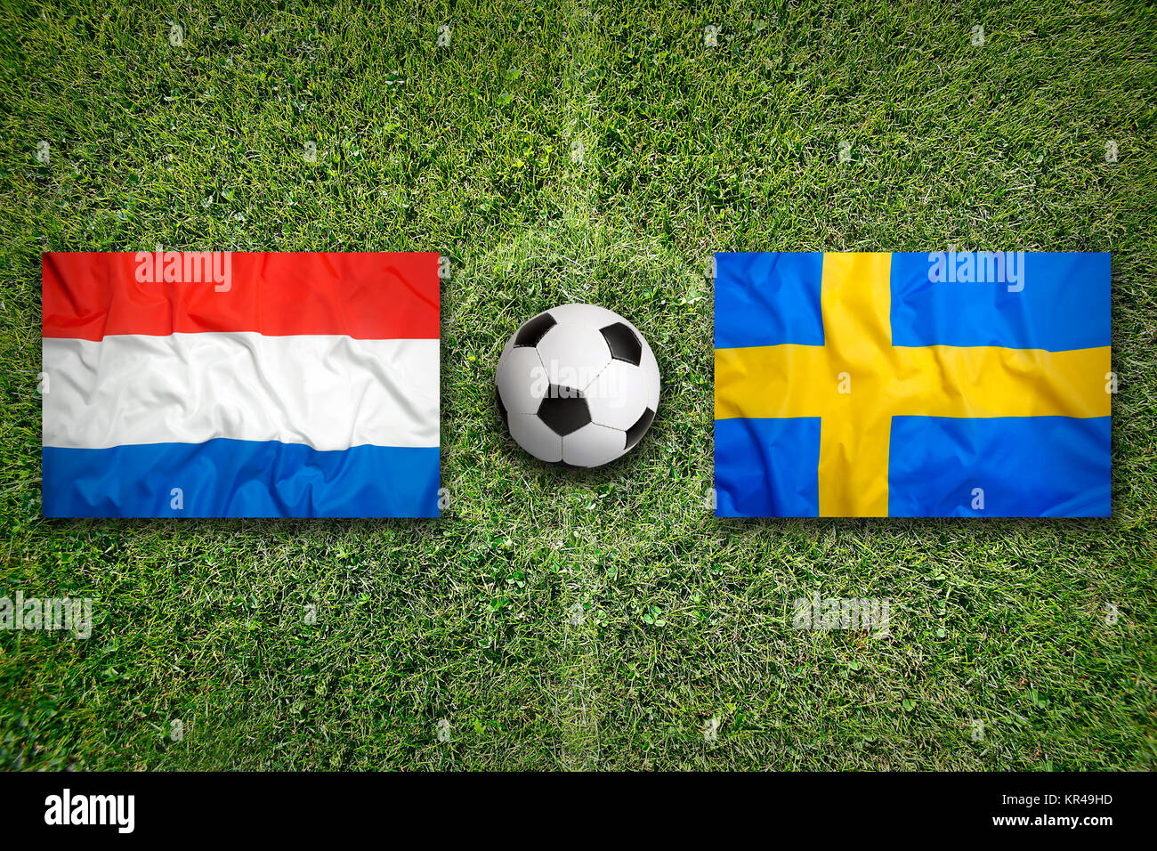 Netherlands vs. Sweden flags on soccer field Stock Photo - Alamy