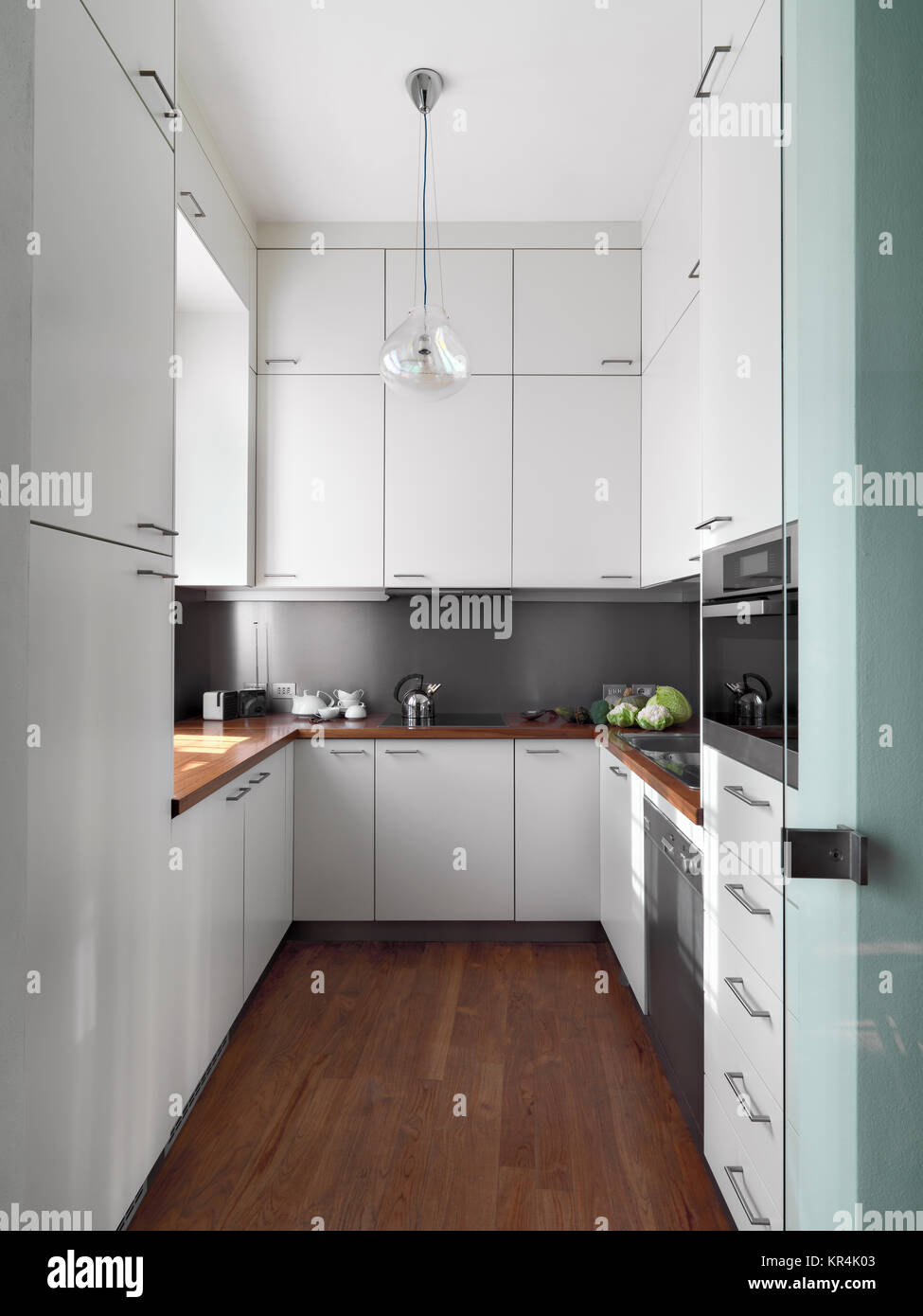 vertical view of a modern kitchen Stock Photo - Alamy
