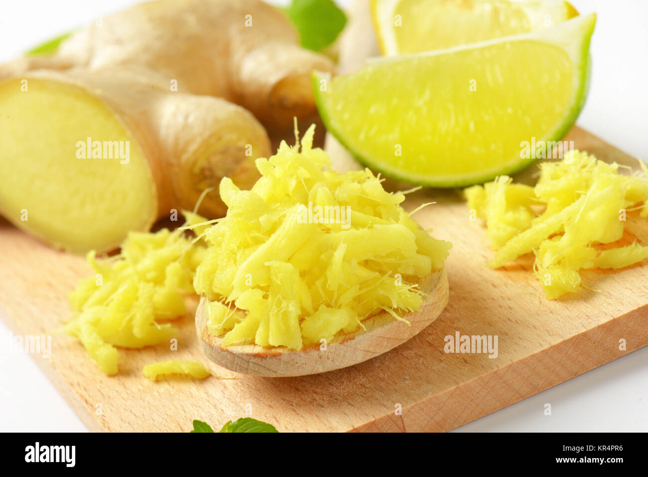 whole and grated ginger Stock Photo Alamy