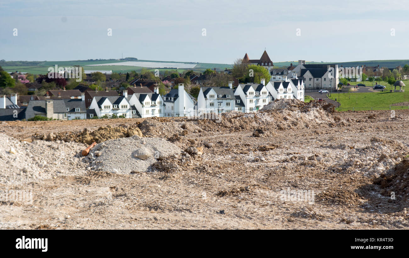Dorchester, England, UK - May 7, 2016 - Completed streets of houses and construction earthworks in Poundbury, Prince Charles's new town under construc Stock Photo
