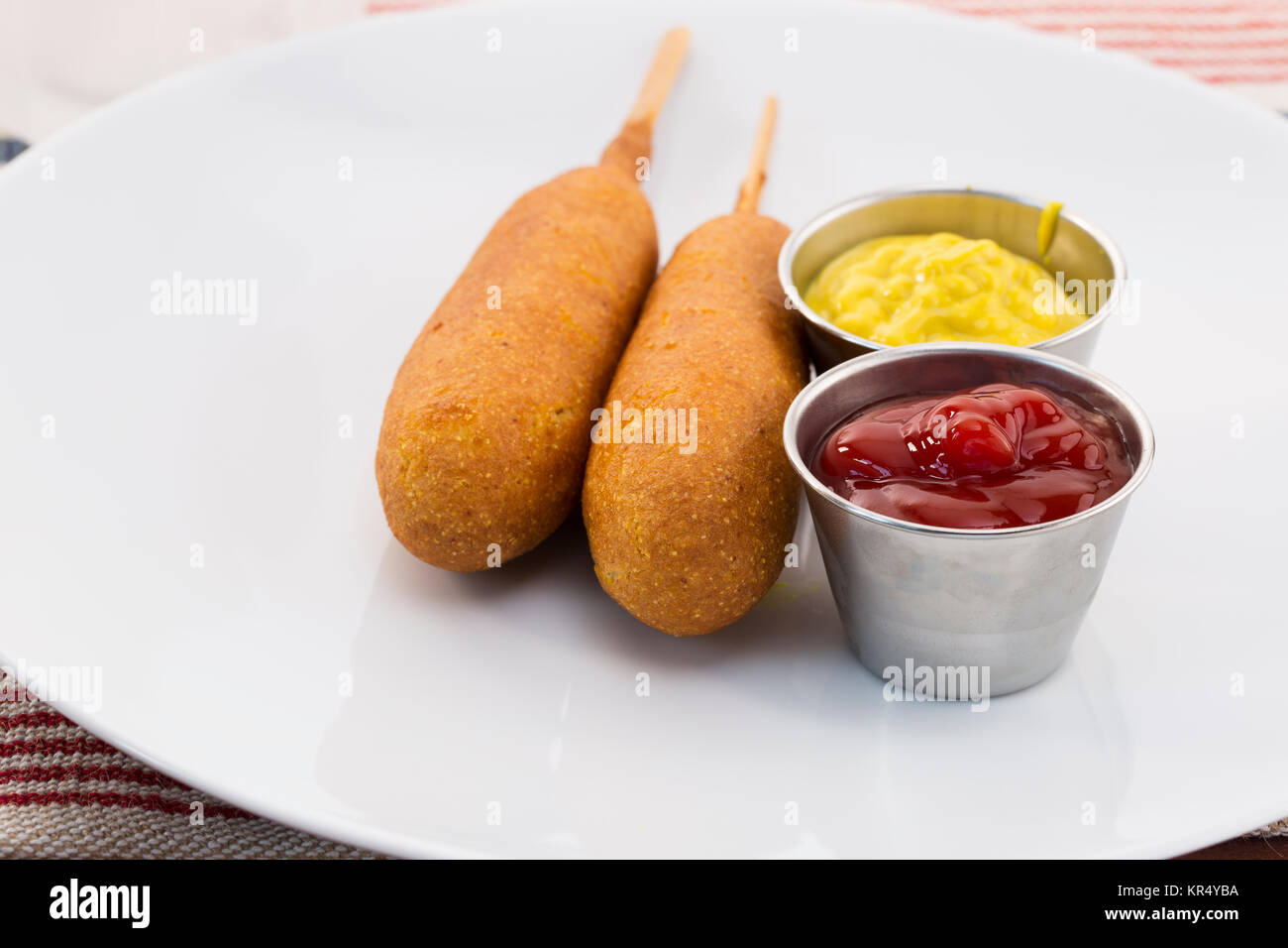Corn Dogs and Condiments on Plate Stock Photo Alamy