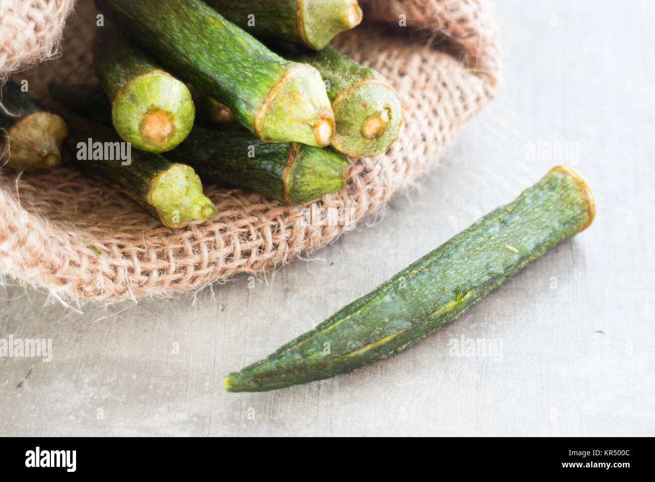 Healthy okra chips on clean background Stock Photo Alamy