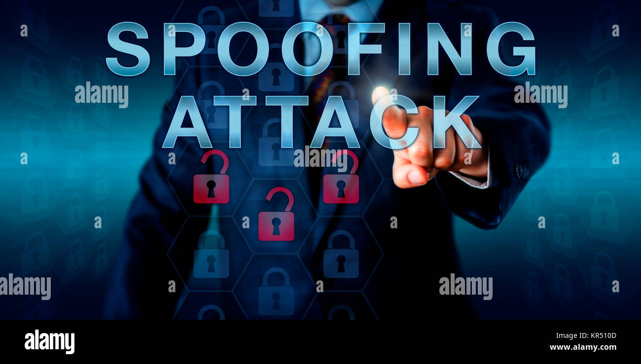 Cyber Investigator Pressing SPOOFING ATTACK Stock Photo