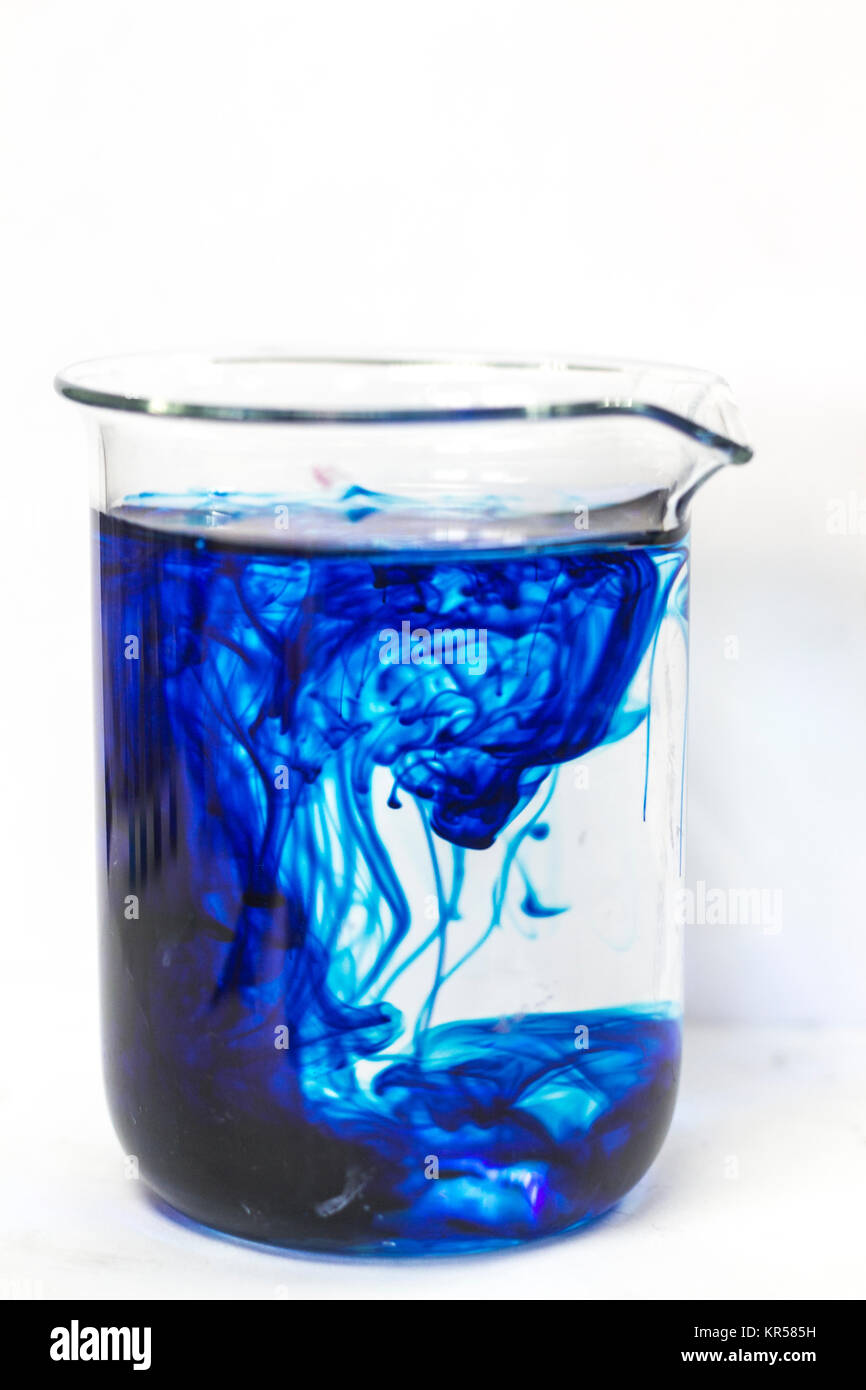 blue in water beaker Stock Photo