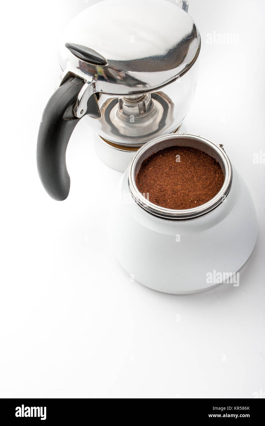 https://c8.alamy.com/comp/KR586K/open-coffee-maker-with-coffee-on-the-white-background-vertical-KR586K.jpg