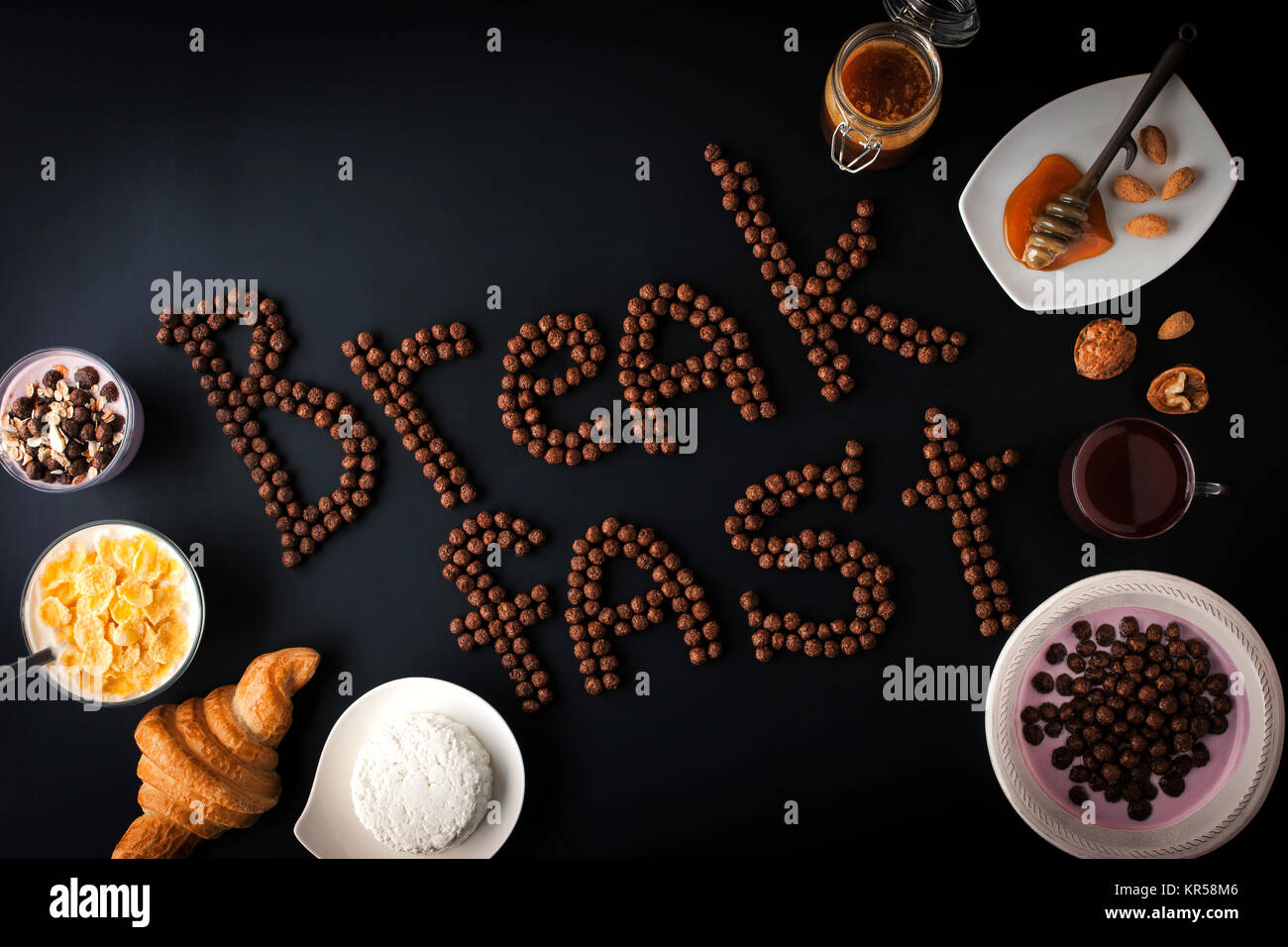 Breakfast word made by chocolate crispy ball with different breakfast attributes Stock Photo