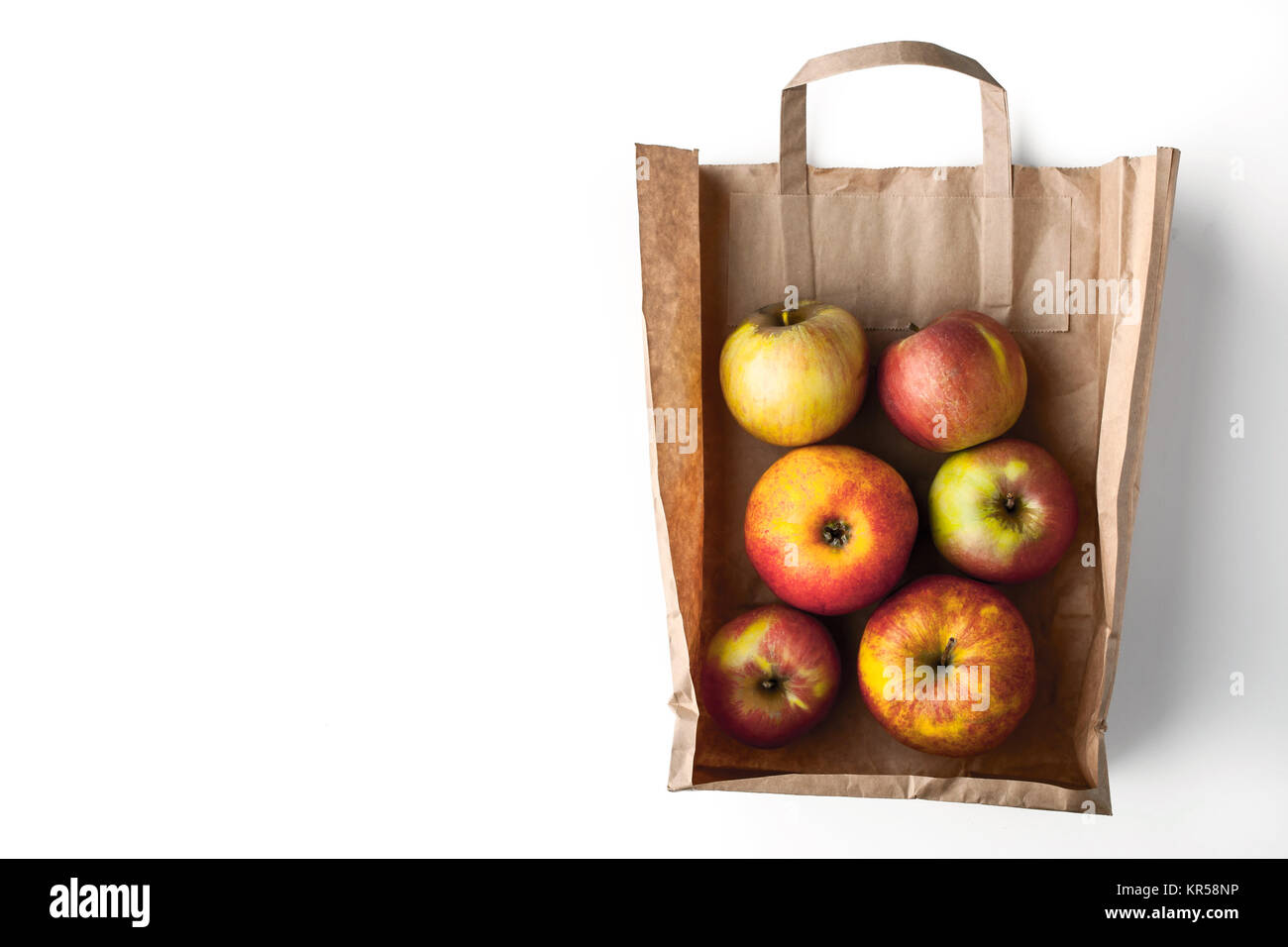 Apples inside a paper bag Stock Photo - Alamy