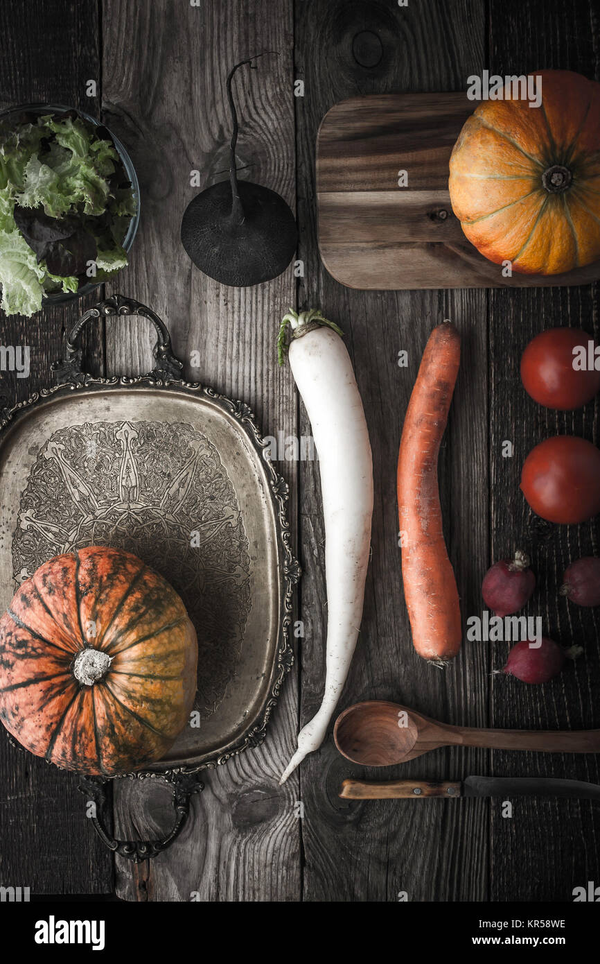 Vegetable mix with vintage tray and kitchenware with film filter effect Stock Photo